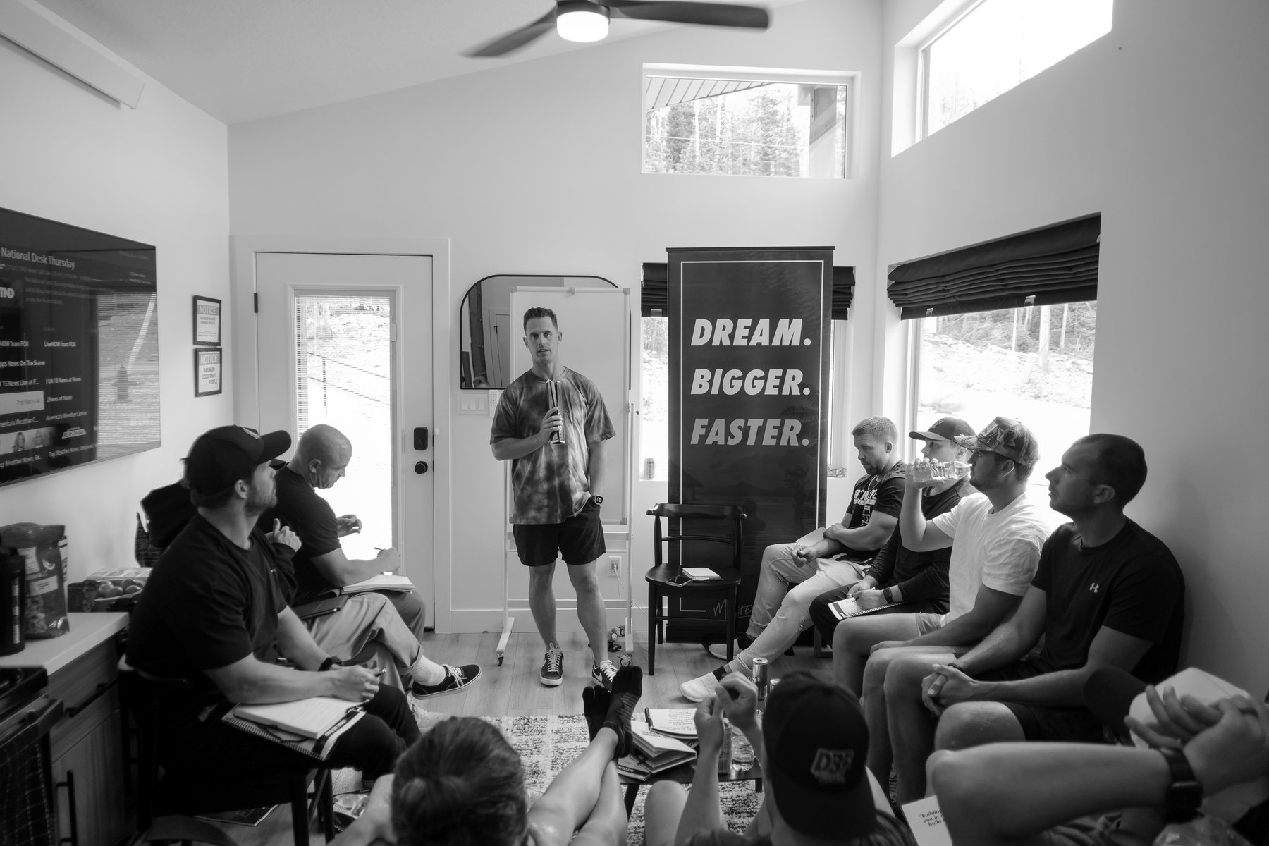 Brody teaching a small group in the room at a Build Big Fast intensive
